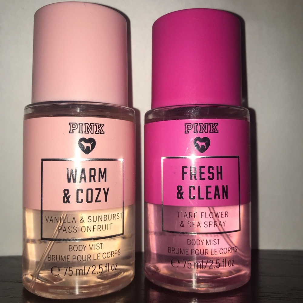 A set of two travel size PINK body mists